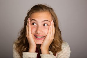 teenage girl with braces